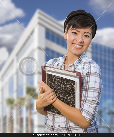 To use this stock image in your creative project, please select the size you need over to the right and click the "Add to Cart" button.
Your downloaded image will come with the Cutcaster watermark removed so don’t worry about the watermark you see on this page. Mixed Race Female Student Holding Books in Front of Building stock photo, Attractive Mixed Race Female Student Holding Books in Front of Building. by Andy Dean