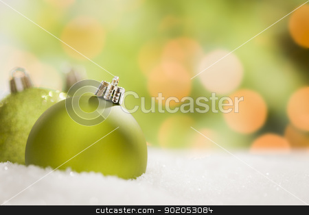 To use this stock image in your creative project, please select the size you need over to the right and click the "Add to Cart" button.
Your downloaded image will come with the Cutcaster watermark removed so don’t worry about the watermark you see on this page. Green Christmas Ornaments on Snow Over an Abstract Background stock photo, Beautiful Matt Green Christmas Ornaments on Snow Flakes Over an Abstract Background with Room For Your Own Text. by Andy Dean