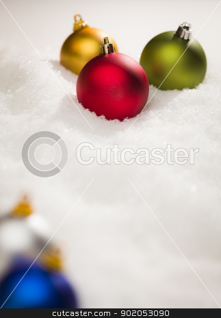 To use this stock image in your creative project, please select the size you need over to the right and click the "Add to Cart" button.
Your downloaded image will come with the Cutcaster watermark removed so don’t worry about the watermark you see on this page. Christmas Ornaments on Snow Flakes with Text Room stock photo, Beautiful Various Colored Christmas Ornaments on Snow Flakes Room For Your Own Text. by Andy Dean