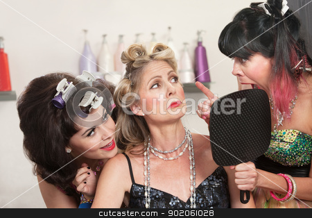 To use this stock image in your creative project, please select the size you need over to the right and click the "Add to Cart" button.
Your downloaded image will come with the Cutcaster watermark removed so don’t worry about the watermark you see on this page. Ladies in Hair Salon Argue stock photo, Emotional women talking about hair styles in beauty salon by Scott Griessel