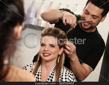 To use this stock image in your creative project, please select the size you need over to the right and click the "Add to Cart" button.
Your downloaded image will come with the Cutcaster watermark removed so don’t worry about the watermark you see on this page. Happy Woman Getting Haircut stock photo, Smiling woman getting haircut by handsome hairdresser by Scott Griessel