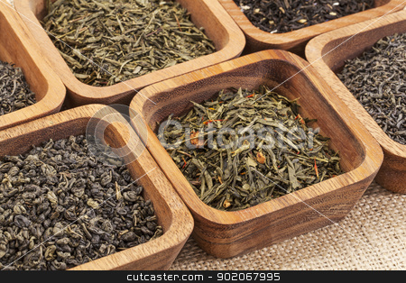 To use this stock image in your creative project, please select the size you need over to the right and click the "Add to Cart" button.
Your downloaded image will come with the Cutcaster watermark removed so don’t worry about the watermark you see on this page. green tea ssample set stock photo, organic green tea samples in square wooden bowls against canvas by Marek Uliasz