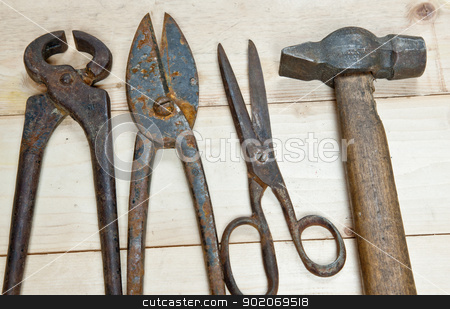 To use this stock image in your creative project, please select the size you need over to the right and click the "Add to Cart" button.
Your downloaded image will come with the Cutcaster watermark removed so don’t worry about the watermark you see on this page. Hammer and nippers on wood background stock photo, Vintage hammer and nippers on wood background by Oleg