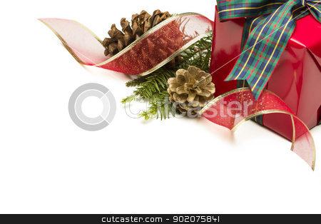 To use this stock image in your creative project, please select the size you need over to the right and click the "Add to Cart" button.
Your downloaded image will come with the Cutcaster watermark removed so don’t worry about the watermark you see on this page. Christmas Present with Ribbon, Pine Cones and Pine Branches on W stock photo, Christmas Present with Ribbon, Pine Cones and Pine Branches Isolated on a White Background. by Andy Dean