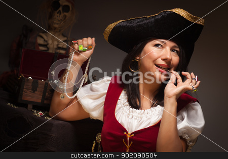 To use this stock image in your creative project, please select the size you need over to the right and click the "Add to Cart" button.
Your downloaded image will come with the Cutcaster watermark removed so don’t worry about the watermark you see on this page. Dramatic Female Pirate Biting A Coin stock photo, Dramatic Female Pirate Biting a Coin in a Dimly Lit Moody Scene. by Andy Dean