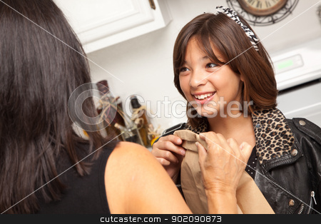To use this stock image in your creative project, please select the size you need over to the right and click the "Add to Cart" button.
Your downloaded image will come with the Cutcaster watermark removed so don’t worry about the watermark you see on this page. Pretty Hispanic Girl Ready for School with Mom stock photo, Pretty Hispanic Girl and Mother Getting Ready for School in the Kitchen. by Andy Dean