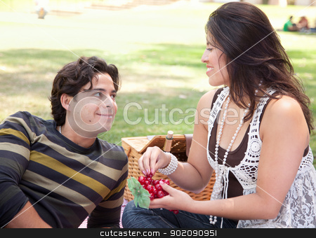 To use this stock image in your creative project, please select the size you need over to the right and click the "Add to Cart" button.
Your downloaded image will come with the Cutcaster watermark removed so don’t worry about the watermark you see on this page. Attractive Hispanic Couple Having a Picnic in the Park stock photo, Attractive Hispanic Couple Having a Picnic Outdoors in the Park. by Andy Dean