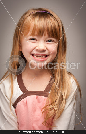 To use this stock image in your creative project, please select the size you need over to the right and click the "Add to Cart" button.
Your downloaded image will come with the Cutcaster watermark removed so don’t worry about the watermark you see on this page. Fun Portrait of an Adorable Red Haired Girl on Grey stock photo, Fun Portrait of an Adorable Red Haired Girl on a Grey Background. by Andy Dean