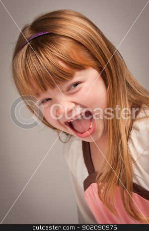 To use this stock image in your creative project, please select the size you need over to the right and click the "Add to Cart" button.
Your downloaded image will come with the Cutcaster watermark removed so don’t worry about the watermark you see on this page. Fun Portrait of an Adorable Red Haired Girl on Grey stock photo, Fun Portrait of an Adorable Red Haired Girl on a Grey Background. by Andy Dean