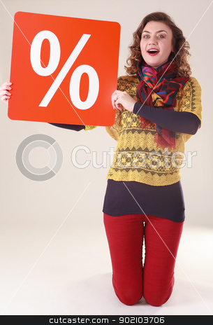To use this stock image in your creative project, please select the size you need over to the right and click the "Add to Cart" button.
Your downloaded image will come with the Cutcaster watermark removed so don’t worry about the watermark you see on this page. Woman with percentage sign stock photo, Young attractive woman with red percent sign for the final sale by Roland Stollner