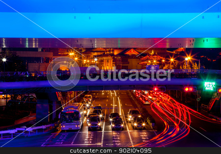 To use this stock image in your creative project, please select the size you need over to the right and click the "Add to Cart" button.
Your downloaded image will come with the Cutcaster watermark removed so don’t worry about the watermark you see on this page. Blue Highway Street Traffic Red Night Light Trails Jingan Temple stock photo, Blue Highway Street Traffic Cars and Light Trails Jingan Temple at Night in Central Shanghai, China. by William Perry