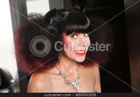To use this stock image in your creative project, please select the size you need over to the right and click the "Add to Cart" button.
Your downloaded image will come with the Cutcaster watermark removed so don’t worry about the watermark you see on this page. White Lady in Afro and Big Smile stock photo, Excited Caucasian woman with afro haircut and big grin by Scott Griessel