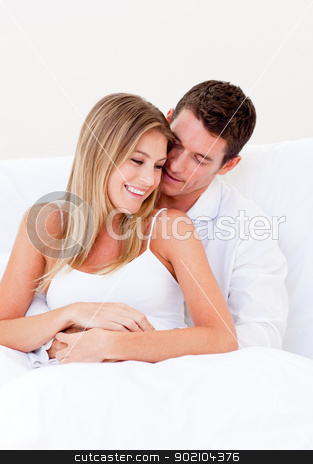 To use this stock image in your creative project, please select the size you need over to the right and click the "Add to Cart" button.
Your downloaded image will come with the Cutcaster watermark removed so don’t worry about the watermark you see on this page. Portrait of a loving couple sitting on bed stock photo, Portrait of a loving couple sitting on bed at home by Wavebreak Media