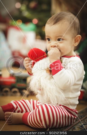 To use this stock image in your creative project, please select the size you need over to the right and click the "Add to Cart" button.
Your downloaded image will come with the Cutcaster watermark removed so don’t worry about the watermark you see on this page. Infant Baby Enjoying Christmas Morning Near The Tree stock photo, Cute Infant Baby Enjoying Christmas Morning Near The Tree. by Andy Dean