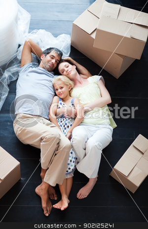 To use this stock image in your creative project, please select the size you need over to the right and click the "Add to Cart" button.
Your downloaded image will come with the Cutcaster watermark removed so don’t worry about the watermark you see on this page. Parents and daughter lying on the floor stock photo, Parents and daughter lying on the floor of their new house by Wavebreak Media