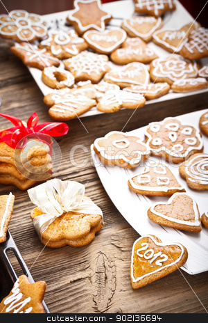 To use this stock image in your creative project, please select the size you need over to the right and click the "Add to Cart" button.
Your downloaded image will come with the Cutcaster watermark removed so don’t worry about the watermark you see on this page. Christmas cookie stock photo, Traditional homemade Christmas cookie gingerbreads by Grafvision