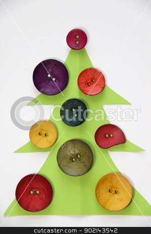 To use this stock image in your creative project, please select the size you need over to the right and click the "Add to Cart" button.
Your downloaded image will come with the Cutcaster watermark removed so don’t worry about the watermark you see on this page. Christmas in creative style stock photo, Paper Christmas tree decorated with vivid buttons and funny toys by Tatiana Mihaliova