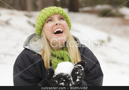 To use this stock image in your creative project, please select the size you need over to the right and click the "Add to Cart" button.
Your downloaded image will come with the Cutcaster watermark removed so don’t worry about the watermark you see on this page. Attractive Woman Having Fun in the Snow stock photo, Attractive Woman Having Fun in the Snow on a Winter Day. by Andy Dean