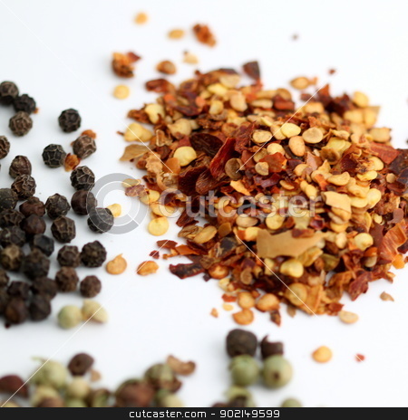 To use this stock image in your creative project, please select the size you need over to the right and click the "Add to Cart" button.
Your downloaded image will come with the Cutcaster watermark removed so don’t worry about the watermark you see on this page. Chili Pepper stock photo, Closeup of chili flakes, black and green pepper. by Henrik Lehnerer