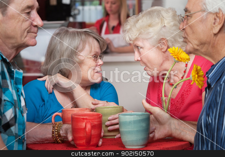 To use this stock image in your creative project, please select the size you need over to the right and click the "Add to Cart" button.
Your downloaded image will come with the Cutcaster watermark removed so don’t worry about the watermark you see on this page. Senior Couples Chatting in Cafe stock photo, Mature group of husbands and wives gossiping in a restaurant by Scott Griessel