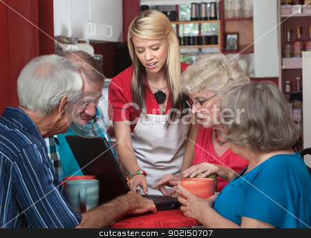 To use this stock image in your creative project, please select the size you need over to the right and click the "Add to Cart" button.
Your downloaded image will come with the Cutcaster watermark removed so don’t worry about the watermark you see on this page. Helpful Waitress with Seniors on Laptop stock photo, Waitress helping senior citizens with computer in coffeehouse by Scott Griessel
