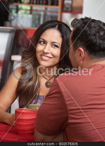 To use this stock image in your creative project, please select the size you need over to the right and click the "Add to Cart" button.
Your downloaded image will come with the Cutcaster watermark removed so don’t worry about the watermark you see on this page. Skeptical Woman Looking at Man in Cafe stock photo, Skeptical Hispanic woman listening to man talk in cafe by Scott Griessel