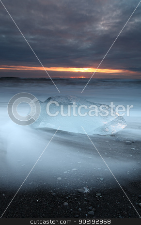 To use this stock image in your creative project, please select the size you need over to the right and click the "Add to Cart" button.
Your downloaded image will come with the Cutcaster watermark removed so don’t worry about the watermark you see on this page. Iceburg Beach stock photo, Ice on vocanic black sand iceland beach at sunset by Ollie Taylor