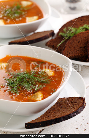 To use this stock image in your creative project, please select the size you need over to the right and click the "Add to Cart" button.
Your downloaded image will come with the Cutcaster watermark removed so don’t worry about the watermark you see on this page. Bowl of red soup and black bread on white table stock photo, Image of bowl of hot red soup and black bread on white wooden table by yekostock