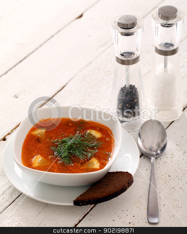 To use this stock image in your creative project, please select the size you need over to the right and click the "Add to Cart" button.
Your downloaded image will come with the Cutcaster watermark removed so don’t worry about the watermark you see on this page. Image of bowl of hot red soup on wooden table stock photo, Image of bowl of hot red soup served with bead, pepper, salt and spoon on white wooden table by yekostock