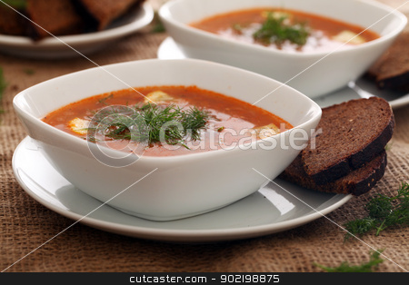 To use this stock image in your creative project, please select the size you need over to the right and click the "Add to Cart" button.
Your downloaded image will come with the Cutcaster watermark removed so don’t worry about the watermark you see on this page. Soup served with bread on a beige tablecloth stock photo, Image of bowls of hot red soup served with bread on a beige tablecloth by yekostock