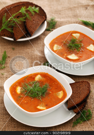 To use this stock image in your creative project, please select the size you need over to the right and click the "Add to Cart" button.
Your downloaded image will come with the Cutcaster watermark removed so don’t worry about the watermark you see on this page. Soup served with bread on a beige tablecloth stock photo, Image of bowls of hot red soup served with bread on a beige tablecloth by yekostock