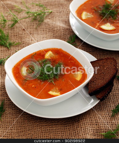 To use this stock image in your creative project, please select the size you need over to the right and click the "Add to Cart" button.
Your downloaded image will come with the Cutcaster watermark removed so don’t worry about the watermark you see on this page. Soup served with bread on a beige tablecloth stock photo, Image of bowls of hot red soup served with bread on a beige tablecloth by yekostock