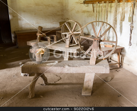 To use this stock image in your creative project, please select the size you need over to the right and click the "Add to Cart" button.
Your downloaded image will come with the Cutcaster watermark removed so don’t worry about the watermark you see on this page. Old spinning wheels in spanish mission stock photo, Old spinning wheel made from timber and branches in La Purisima mission California by Steven Heap