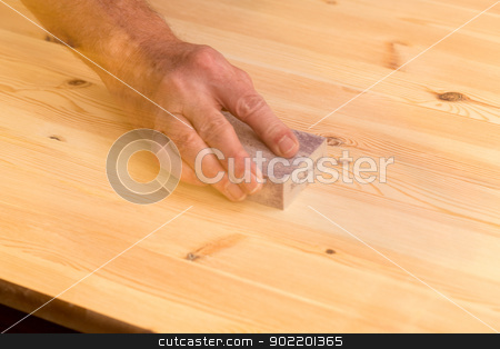 To use this stock image in your creative project, please select the size you need over to the right and click the "Add to Cart" button.
Your downloaded image will come with the Cutcaster watermark removed so don’t worry about the watermark you see on this page. Mans hand on sanding block on pine wood stock photo, Man rubbing sanding block on pine floor or table with ghosting to suggest movement by Steven Heap