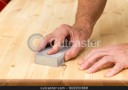 To use this stock image in your creative project, please select the size you need over to the right and click the "Add to Cart" button.
Your downloaded image will come with the Cutcaster watermark removed so don’t worry about the watermark you see on this page. Mans hand on sanding block on pine wood stock photo, Man holding sanding block on pine floor or table sanding surface by Steven Heap