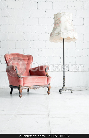 To use this stock image in your creative project, please select the size you need over to the right and click the "Add to Cart" button.
Your downloaded image will come with the Cutcaster watermark removed so don’t worry about the watermark you see on this page. sofa with desk lamp in vintage room stock photo, Pink classical style Armchair sofa couch in vintage room with desk lamp by Vichaya Kiatying-Angsulee