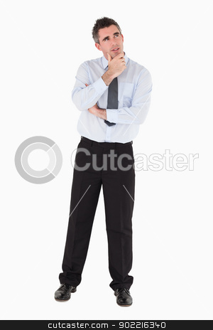 To use this stock image in your creative project, please select the size you need over to the right and click the "Add to Cart" button.
Your downloaded image will come with the Cutcaster watermark removed so don’t worry about the watermark you see on this page. Thoughtful businessman with his hand on his chin stock photo, Thoughtful businessman with his hand on his chin against a white background by Wavebreak Media
