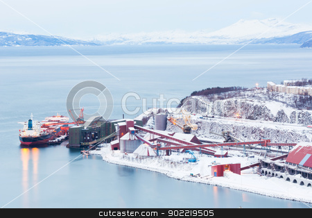 To use this stock image in your creative project, please select the size you need over to the right and click the "Add to Cart" button.
Your downloaded image will come with the Cutcaster watermark removed so don’t worry about the watermark you see on this page. Iron Ore Mine Factory stock photo, Industrial Container Cargo freight ship with working crane bridge in shipyard at Iron Ore Mine Factory Plant in Narvik Norway by Vichaya Kiatying-Angsulee