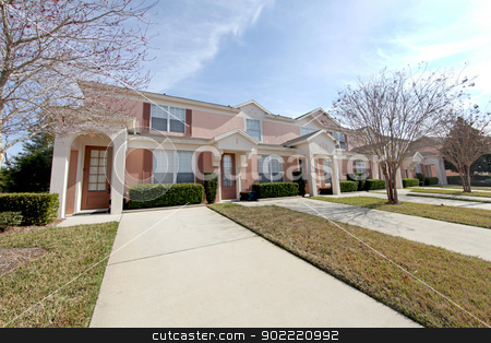 To use this stock image in your creative project, please select the size you need over to the right and click the "Add to Cart" button.
Your downloaded image will come with the Cutcaster watermark removed so don’t worry about the watermark you see on this page. Townhomes stock photo, A set of pink townhomes in Florida by Lucy Clark