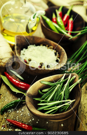 To use this stock image in your creative project, please select the size you need over to the right and click the "Add to Cart" button.
Your downloaded image will come with the Cutcaster watermark removed so don’t worry about the watermark you see on this page. herbs and spices stock photo, wooden bowls with fresh herbs and spices by klenova