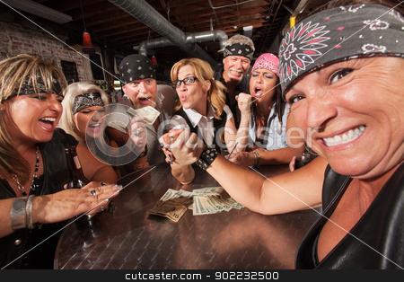 To use this stock image in your creative project, please select the size you need over to the right and click the "Add to Cart" button.
Your downloaded image will come with the Cutcaster watermark removed so don’t worry about the watermark you see on this page. Nerd Beats Biker in Arm Wrestling stock photo, Tough female losing an arm wrestling contest with nerd by Scott Griessel