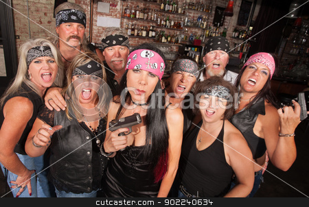 To use this stock image in your creative project, please select the size you need over to the right and click the "Add to Cart" button.
Your downloaded image will come with the Cutcaster watermark removed so don’t worry about the watermark you see on this page. Biker Woman with Pistol stock photo, Serious pretty biker woman holding pistol with group by Scott Griessel