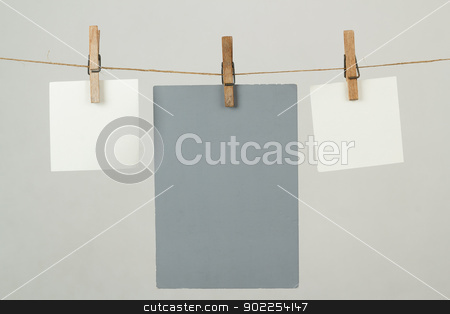 To use this stock image in your creative project, please select the size you need over to the right and click the "Add to Cart" button.
Your downloaded image will come with the Cutcaster watermark removed so don’t worry about the watermark you see on this page. Memory note papers hanging on cord stock photo, white memory note papers hanging on cord by Artush