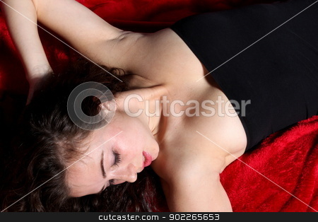 To use this stock image in your creative project, please select the size you need over to the right and click the "Add to Cart" button.
Your downloaded image will come with the Cutcaster watermark removed so don’t worry about the watermark you see on this page. Sexy Woman stock photo, Portrait of a brunette woman on red. by Henrik Lehnerer
