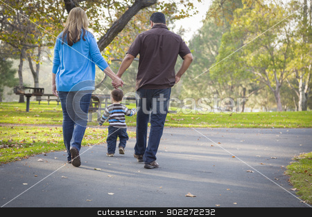 To use this stock image in your creative project, please select the size you need over to the right and click the "Add to Cart" button.
Your downloaded image will come with the Cutcaster watermark removed so don’t worry about the watermark you see on this page. Happy Mixed Race Ethnic Family Walking In The Park stock photo, Happy Young Mixed Race Ethnic Family Walking In The Park. by Andy Dean