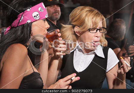 To use this stock image in your creative project, please select the size you need over to the right and click the "Add to Cart" button.
Your downloaded image will come with the Cutcaster watermark removed so don’t worry about the watermark you see on this page. Nerd Reacting to Whiskey in Tavern stock photo, Female nerd sticking out tongue after tasting whiskey in bar by Scott Griessel