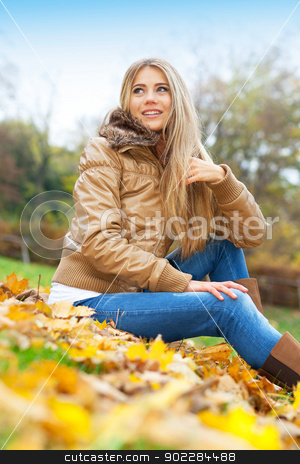 To use this stock image in your creative project, please select the size you need over to the right and click the "Add to Cart" button.
Your downloaded image will come with the Cutcaster watermark removed so don’t worry about the watermark you see on this page. Blond woman sitting in a park stock photo, Young woman in a park in autumn by tristanbm