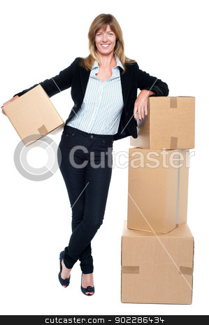 To use this stock image in your creative project, please select the size you need over to the right and click the "Add to Cart" button.
Your downloaded image will come with the Cutcaster watermark removed so don’t worry about the watermark you see on this page. Business executive relocating her office space stock photo, Portrait of a business executive posing beside pile of cartons while holding one. by Ishay Botbol