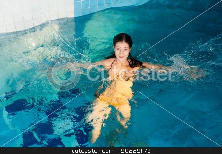 To use this stock image in your creative project, please select the size you need over to the right and click the "Add to Cart" button.
Your downloaded image will come with the Cutcaster watermark removed so don’t worry about the watermark you see on this page. Attractive girl in swimming pool stock photo, Young beautiful woman relaxing in swimming pool by Aikon
