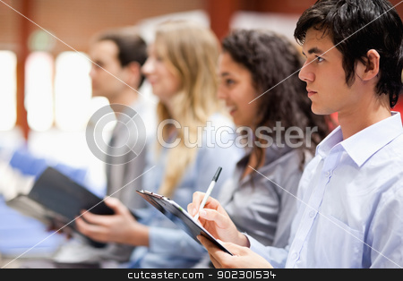 To use this stock image in your creative project, please select the size you need over to the right and click the "Add to Cart" button.
Your downloaded image will come with the Cutcaster watermark removed so don’t worry about the watermark you see on this page. Business people taking notes stock photo, Business people taking notes during a presentation by Wavebreak Media
